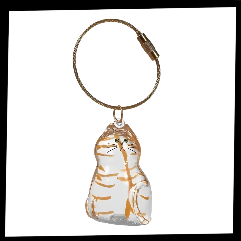 Porte-clés capsule poils de chat - Ozerty